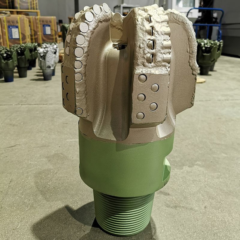 Side view detail of 10 5/8" steel body PDC drill bit showing 16mm cutters